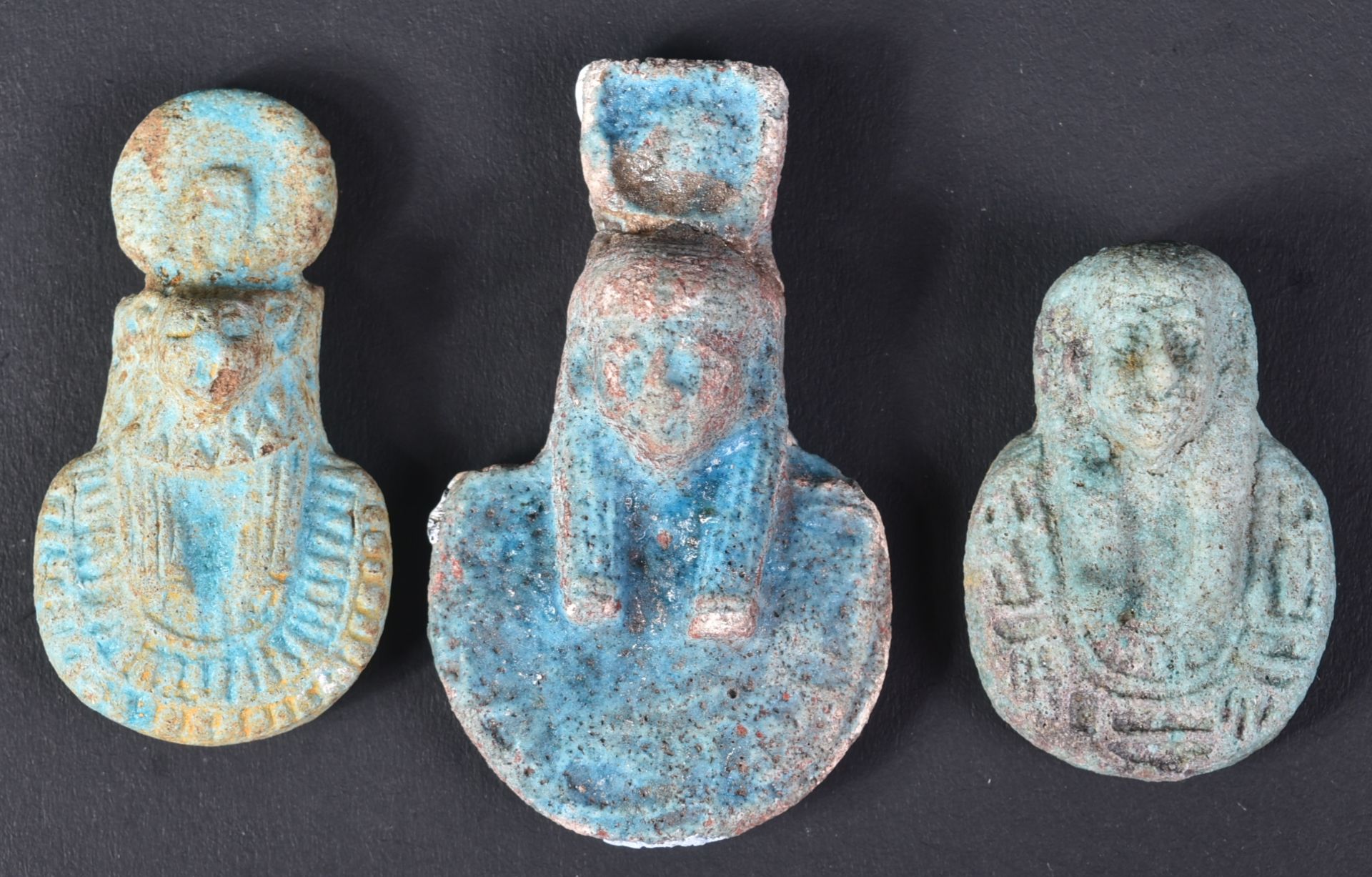 COLLECTION OF THREE EGYPTIAN BLUE FAIENCE BUSTS