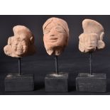 THREE 14TH CENTURY JAVASENE EARLY POTTERY HEADS