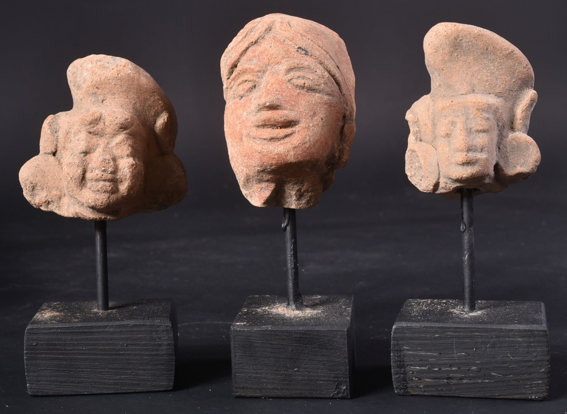 THREE 14TH CENTURY JAVASENE EARLY POTTERY HEADS