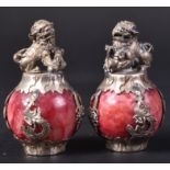 PAIR OF 20TH CENTURY CHINESE WHITE METAL & MARBLE FOO DOGS