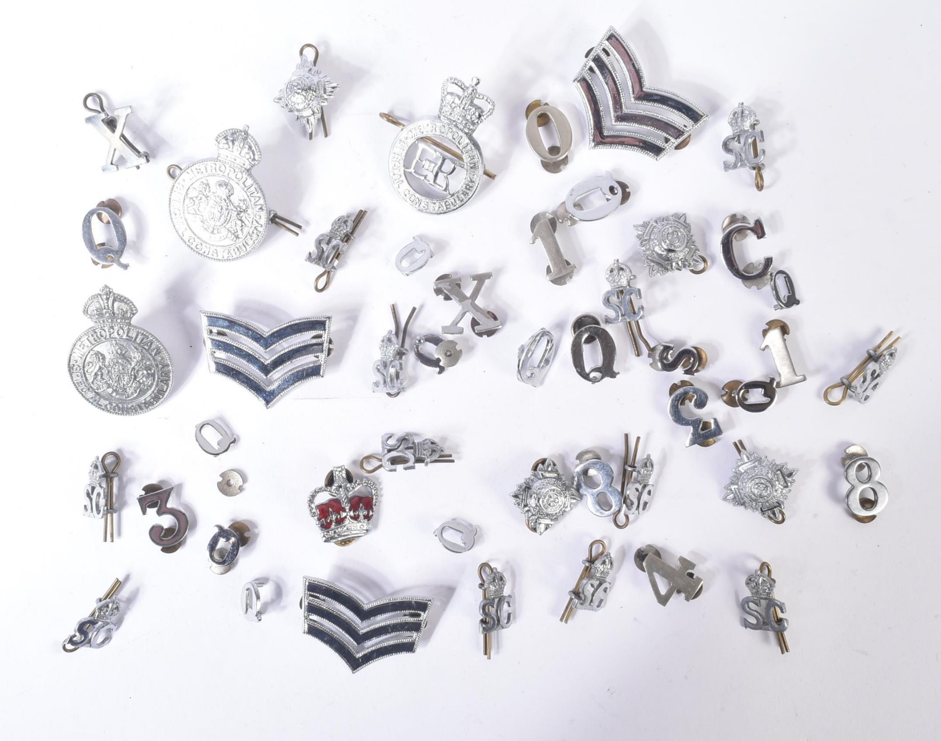 COLLECTION OF VINTAGE BRITISH POLICE UNIFORM BADGES