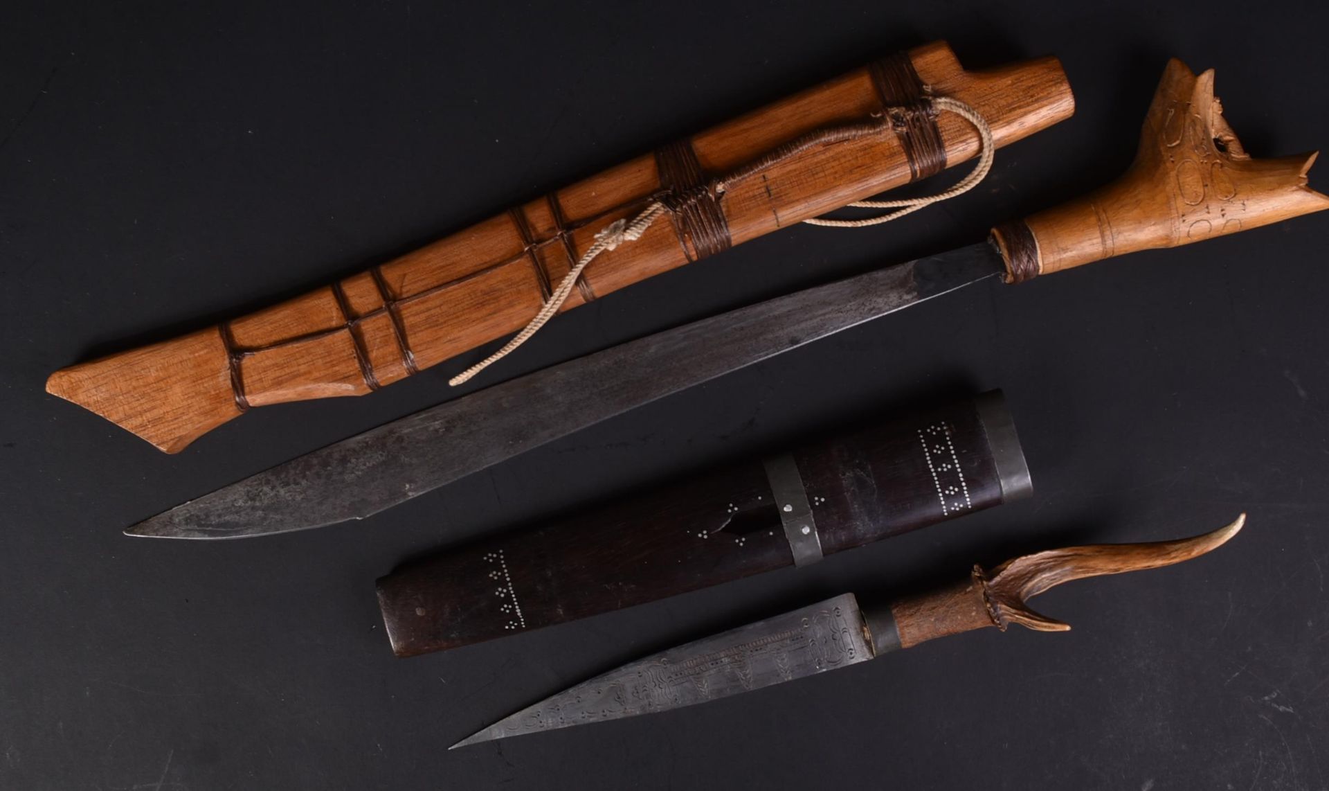 TWO VINTAGE SOUTH EAST ASIAN ETHNIC DAGGERS