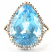 HALLMARKED 9CT GOLD BLUE STONE & DIAMOND HALO RING