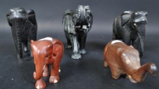 COLLECTION OF FIVE WOODEN ELEPHANT STATUES