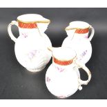 SET OF THREE COALPORT CAUGHLEY MASK GRADUATING VASES