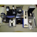 A collection of boxed lady's quartz wrist watches, including a Lorus Tri-Lum SX, two other Lorus