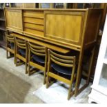 A vintage EON (Elliotts of Newbury) 1960's teak highboard sideboard/serving cabinet dining suite