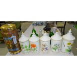 Five Warin Limoges pharmacy storage jars and covers, including Papavi Reas, Vitis Vinif, Arnica