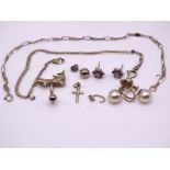 A 9ct gold bracelet, a 9ct gold belly button bar and other items, gross weight 8.7g.