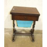 A Victorian mahogany work table, the fold-over top above a drawer and work-box, 52cm wide.