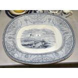 A large Copeland blue and white transfer-printed meat plate with gravy well, decorated with three