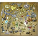 A quantity of figurative jewellery, mainly brooches, (approximately fifty).