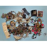 A quantity of gem-set rings with silver and base metal mounts, a silver bracelet set iolite and a