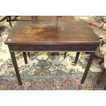 A Georgian mahogany fold-over card table on square chamfered legs, 92cm wide, a mahogany half-