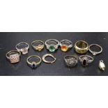 A 9ct gold ring set four citrines, eight various silver rings, some gem set and other items.