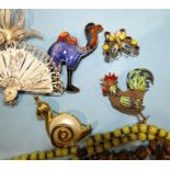 A filigree and enamel cockerel brooch, ten cloisonné bangles and a quantity of costume jewellery.