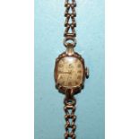 A lady's Avia 9ct-gold-cased wrist watch on 9ct gold bracelet, gross weight 14.5g.