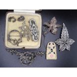 A marcasite and silver necklace, a filigree brooch and other jewellery.