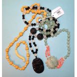 A Chinese aventurine quartz and coral necklace and two other hardstone bead necklaces, (one a/f), (