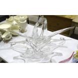 A large studio clear glass bowl/centrepiece of free-form design, 31cm high, 84.5cm wide and a