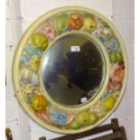 A barbola-work circular mirror decorated with flowers and fruit, 56cm diameter, a wood-framed