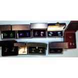 Nine pairs of .925 silver cufflinks, boxed.