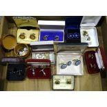 A large quantity of cufflinks, tie pins, lighters, etc.