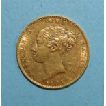 A Queen Victoria 1861 gold half-sovereign.
