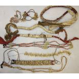 A collection of Oceanic beadwork and tooth necklaces and headbands.