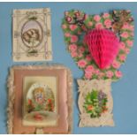 A chromolithographed Valentine in the form of a heart-shaped bower with central pink tissue