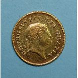 A George III 1810 gold third-guinea.