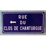 A French enamelled road sign "Rue Du Clos De Chanturgue", white font on blue background, 30 x 60cm.