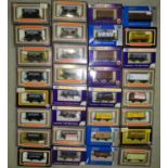 Dapol OO gauge, 32 various boxed wagons and tankers, (32).