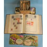 The Meteor stamp album, with British and world stamps, loose stamps, tea cards and other ephemera.