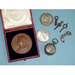 A Queen Victoria 1837-1897 commemorative bronze medallion in case, two crowns 1891 and 1937 and a