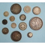 A USA 1890 Morgan silver dollar, New Orleans Mint, a 1918 half-dollar and other silver world