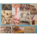 A collection of mainly WWI postcards, including RP's of soldiers prior to receiving their