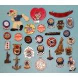 A collection of various enamel and plastic badges, including: 'Butlins 1938 Skegness', 'BBC Radio