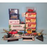 Three boxed Eddie Stobart collectors' models, four boxed Atlas Great British Buses, four unboxed