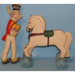 An Art Deco-style pull-along painted wood horse and a "Sunny Jim" Force Wheat Flakes advertising
