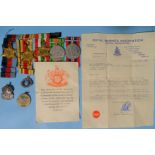 A WWII group of five medals awarded to L W Saunders RM: 1939-45, Africa and Italy Stars, Defence and