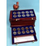 The Danbury Mint 'British Coins of World War II', contained in an eight-drawer display chest, with