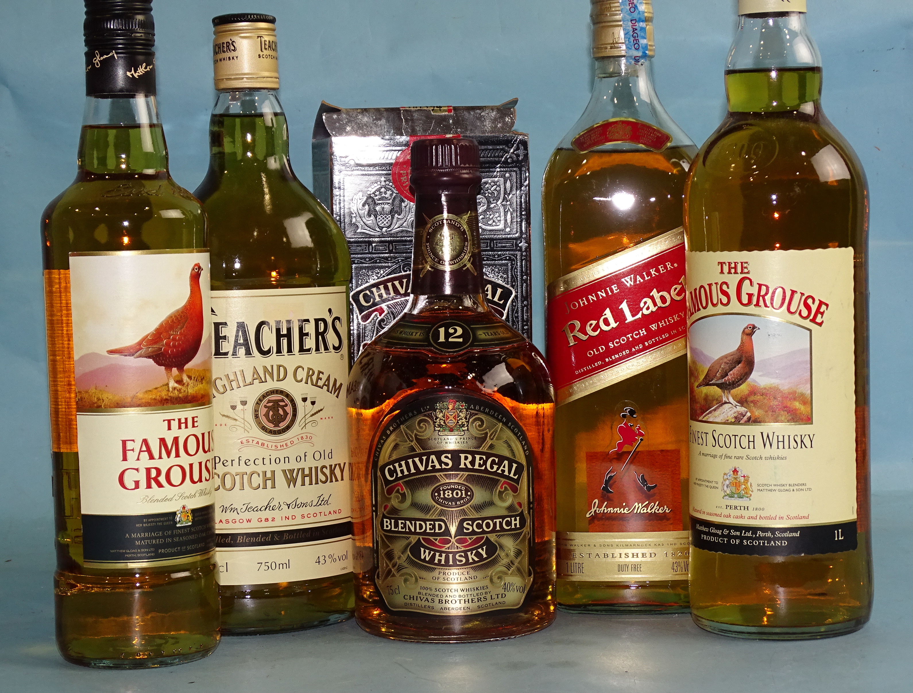 A collection of blended whisky: Famous Grouse 1L, Famous Grouse 70cl, Teachers 75cl, Johnnie