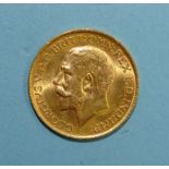 A George V 1914 gold sovereign.