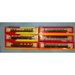 Hornby OO gauge, four boxed GWR chocolate/cream coaches: R4065A, R4065B, R4524 and R4525, one