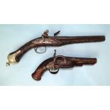 A Turkish flintlock duelling pistol and a converted miquelet belt pistol, the 13.5cm two-stage