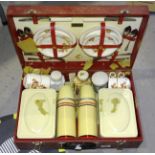 A Brexton picnic set, two pairs of binoculars and other items.