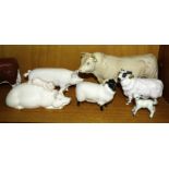 A Beswick Charolais bull, a boar 'Ch. Wall Boy', a pig and piglet 'Piggy Back', a black-faced sheep,