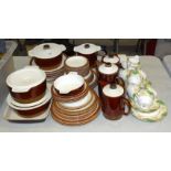 A large collection of Poole Pottery brown and white-glazed ovenproof dinner and tea ware,