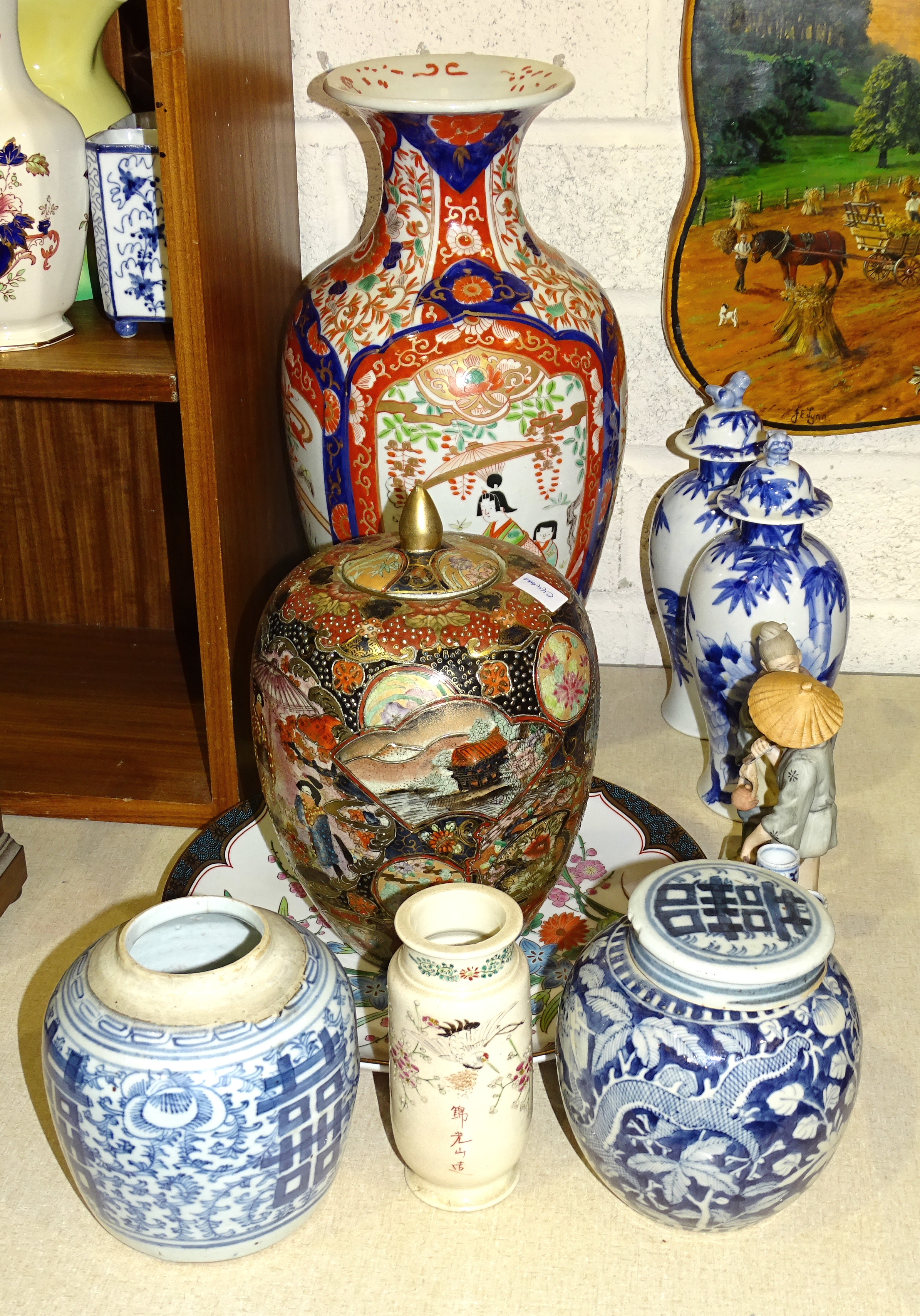 An Imari baluster-shaped vase, 45cm high, two blue and white ginger jars and other Oriental